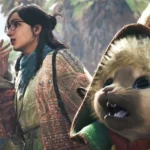 Une chasseuse accompagnee de son compagnon dans Monster Hunter Wilds