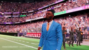 Un entraîneur en costume dans le stade, capture de Football Manager 27