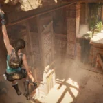 Lara Croft escalade une salle de tombeau dans Tomb Raider: Legacy of Atlantis