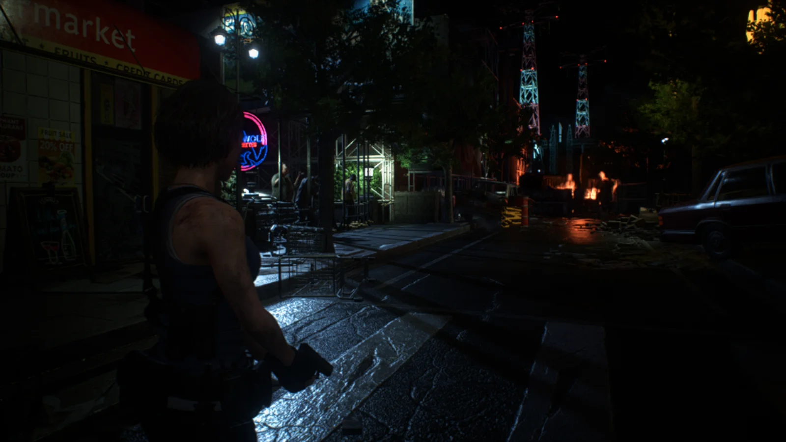 Resident Evil 3 sur Nintendo Switch 2, Jill dans une rue de Raccoon City la nuit